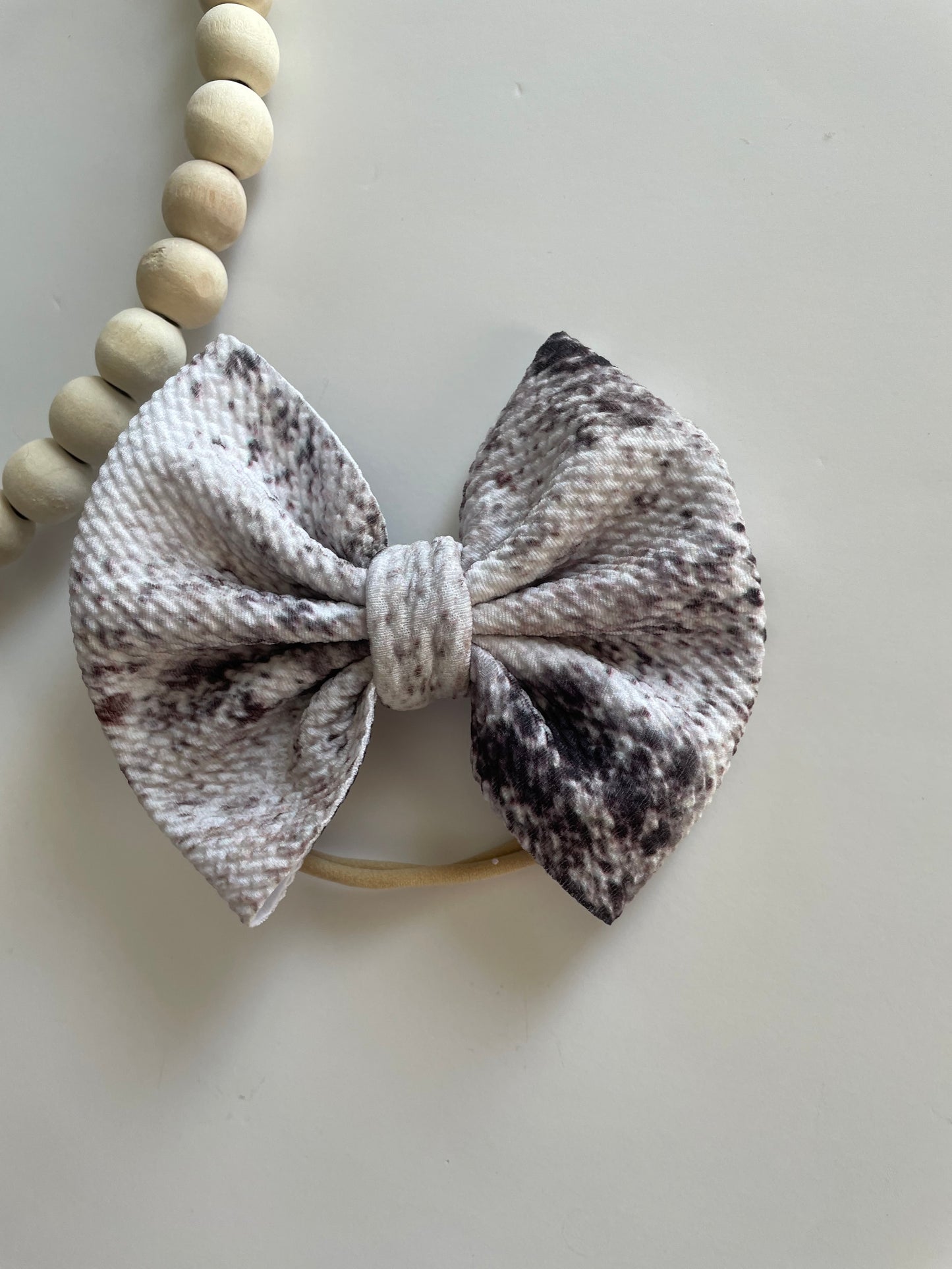 Cowhide bow